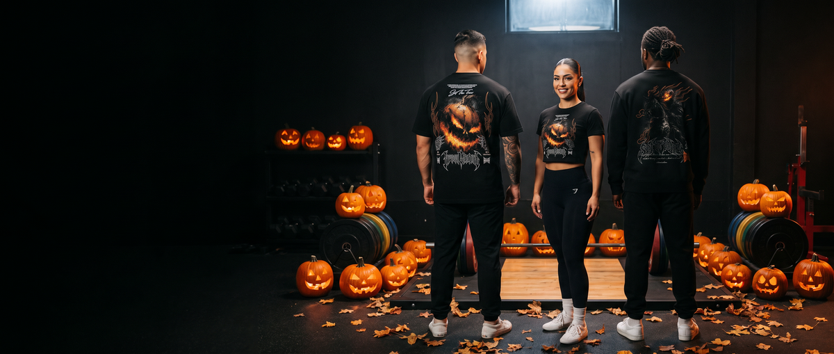 IronGrind athletes in Halloween gear lit by jack-o'-lanterns